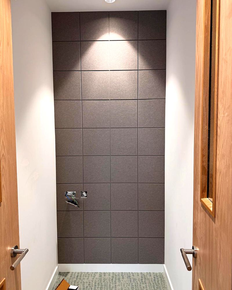 Acoustic tile wall, completed by ADD Construction