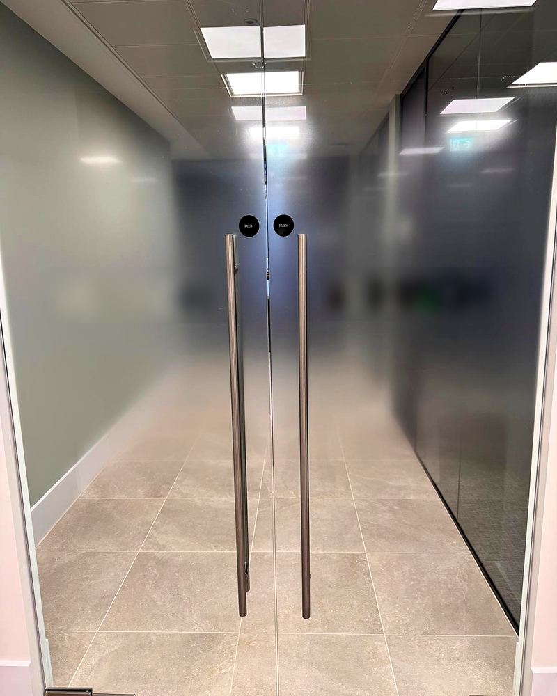 Frameless glass doors, completed by ADD Construction
